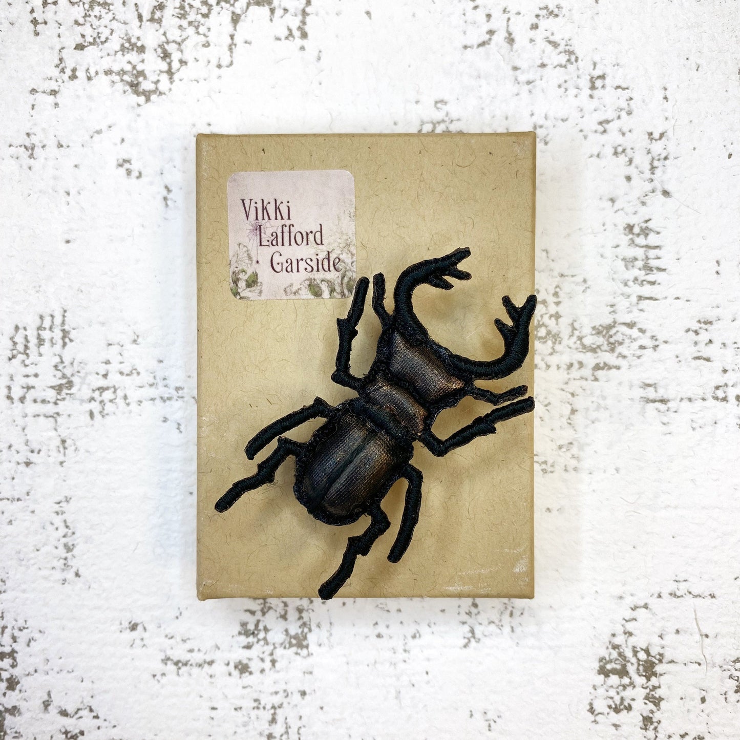 Stag beetle brooch