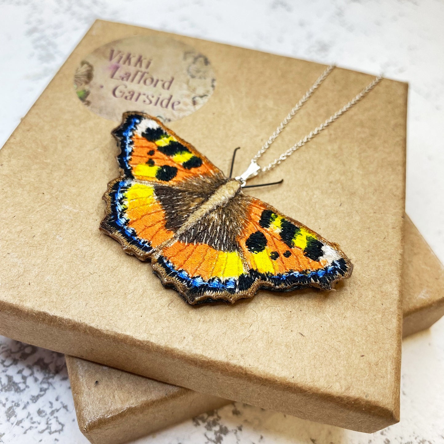 Tortoiseshell butterfly necklace