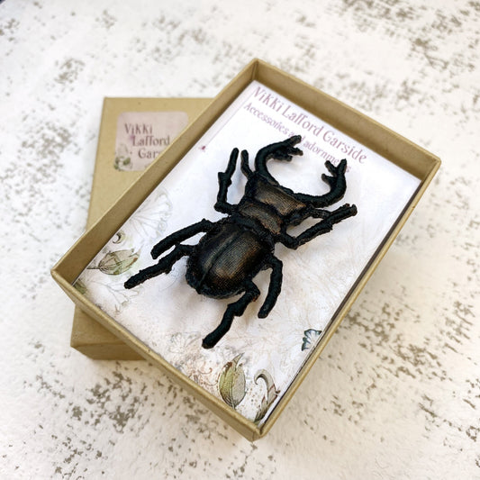 Stag beetle brooch