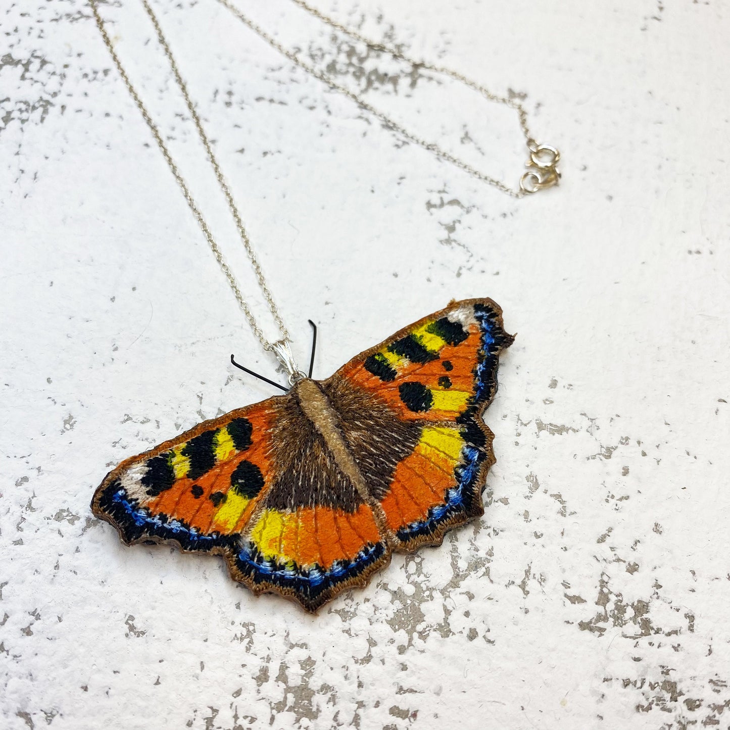 Tortoiseshell butterfly necklace