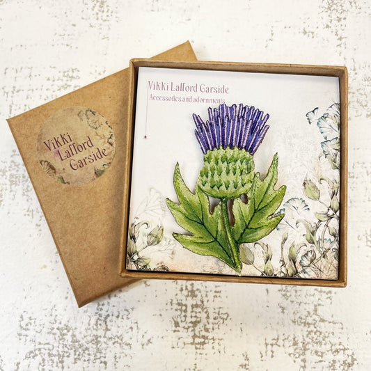 Embroidered and hand painted thistle brooch