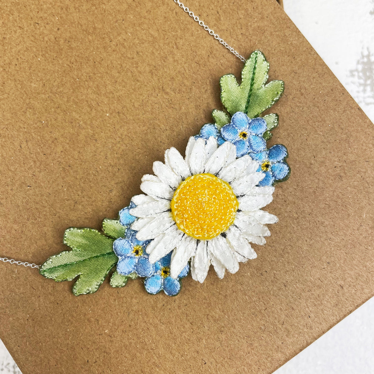 Daisy and forget-me-not necklace