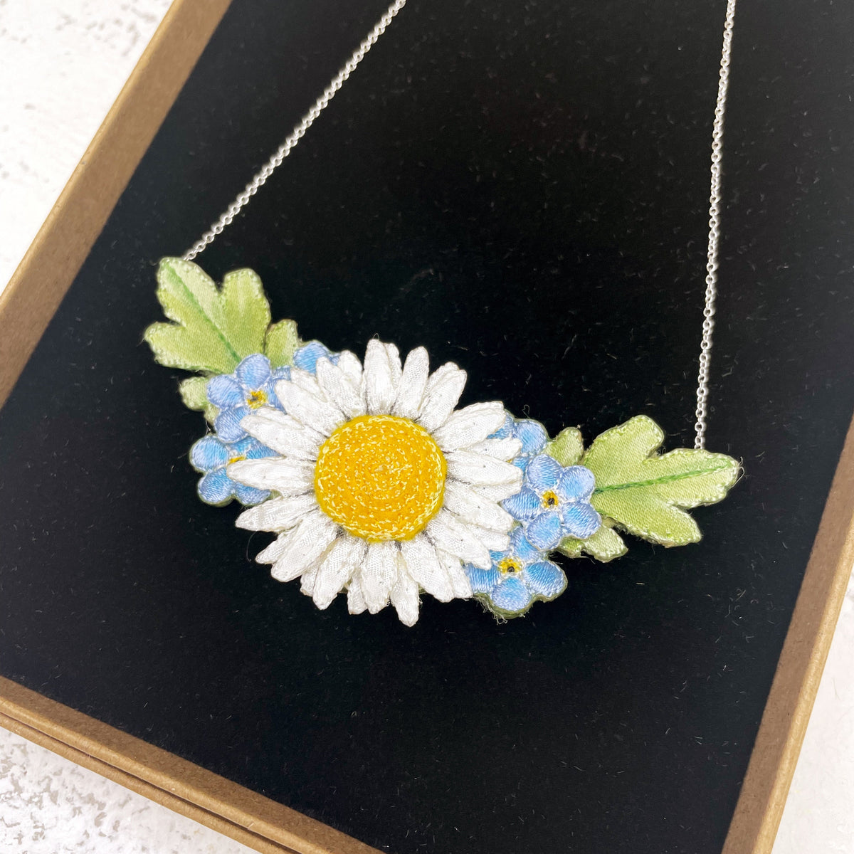 Daisy and forget-me-not necklace