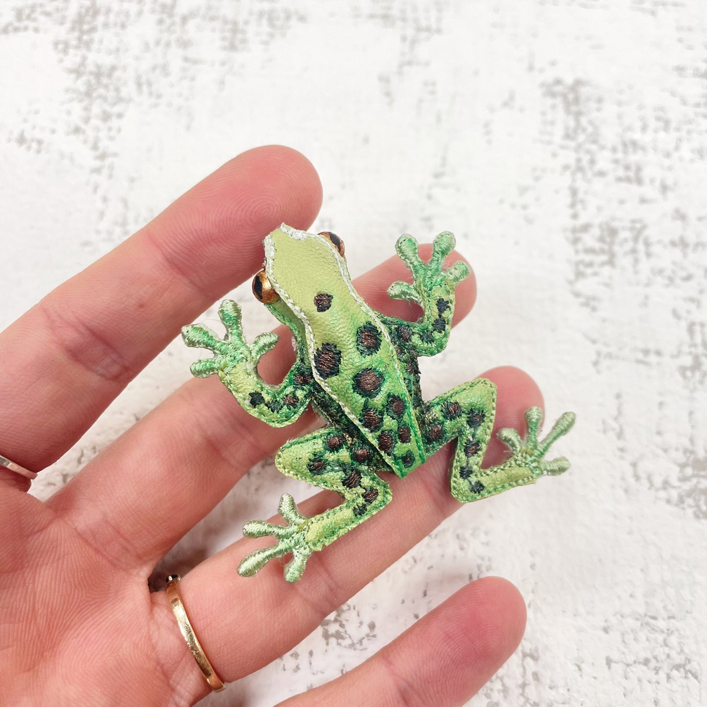 Handcrafted spotted green frog brooch