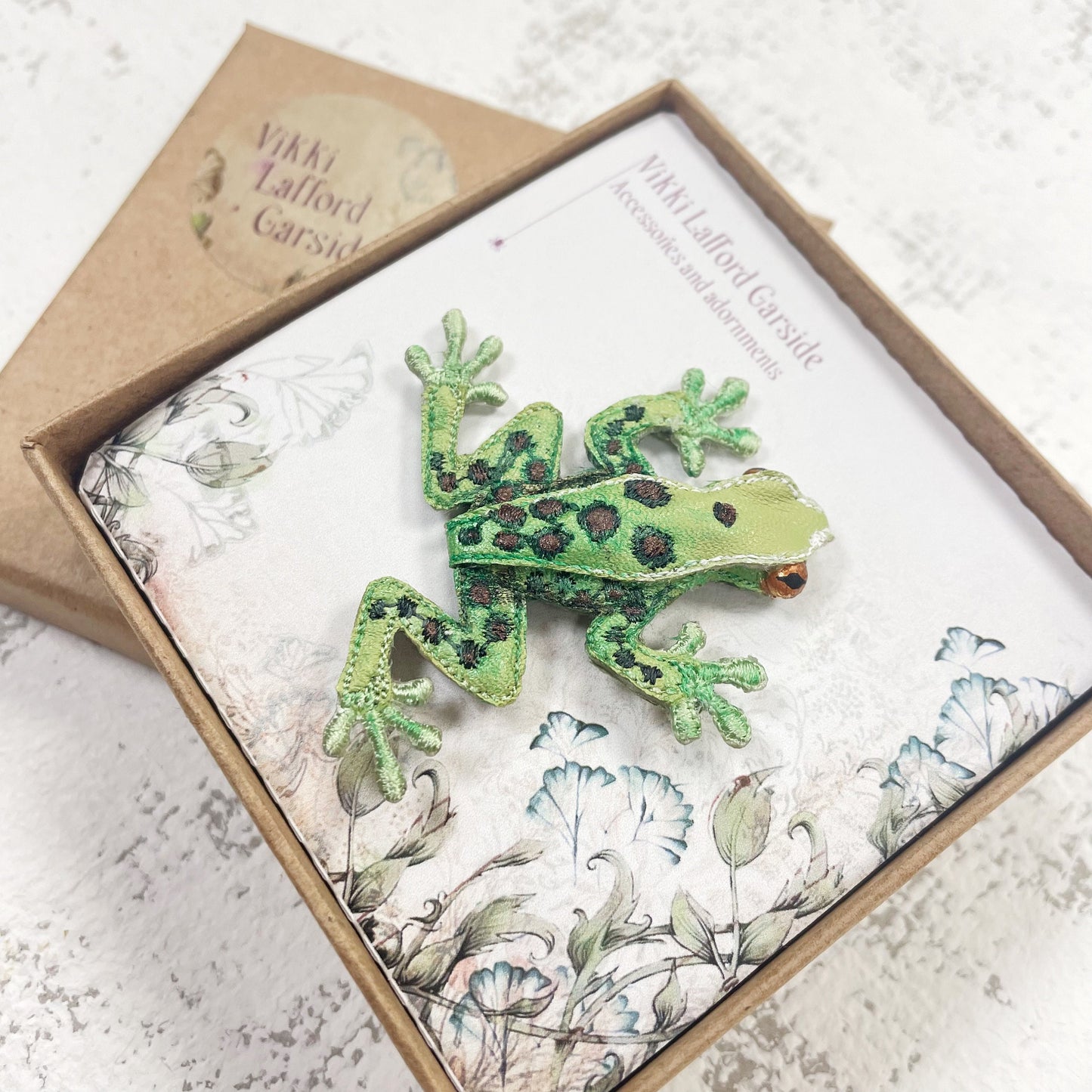 Handcrafted spotted green frog brooch