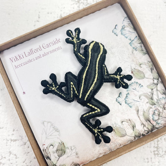 Handcrafted black and yellow striped frog brooch