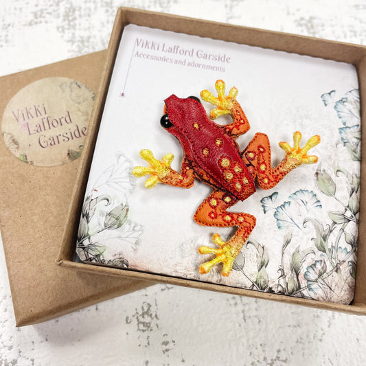 Handcrafted red and yellow spotted frog brooch