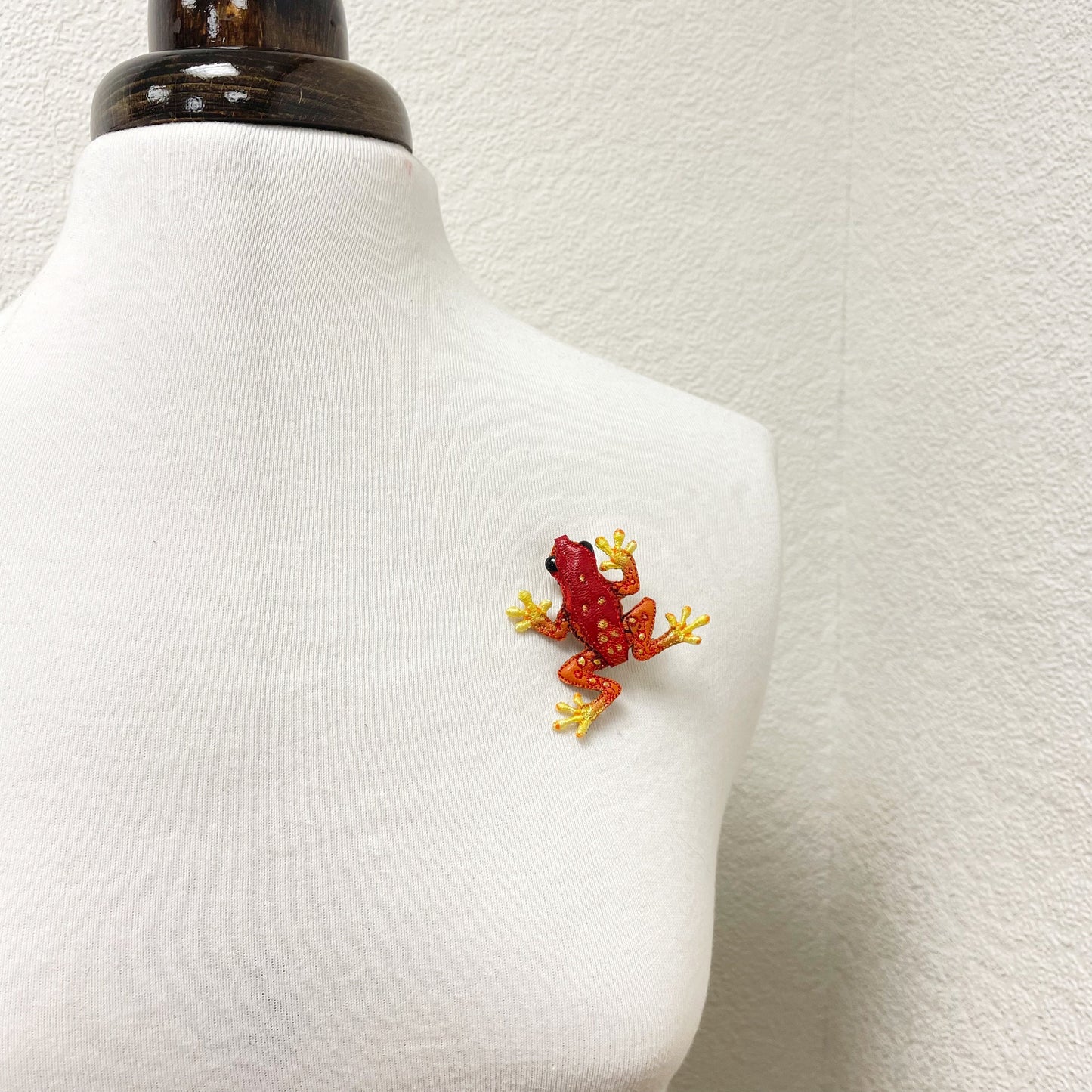Handcrafted red and yellow spotted frog brooch
